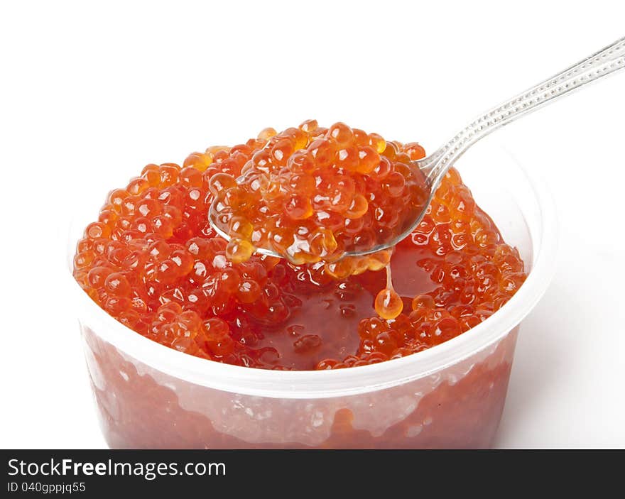 Red caviar in the can on white background. Red caviar in the can on white background