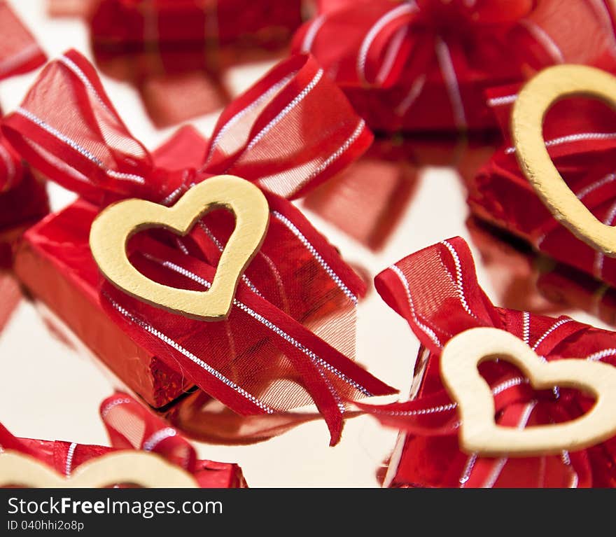 Valentines chocolate in red foil and a hearts