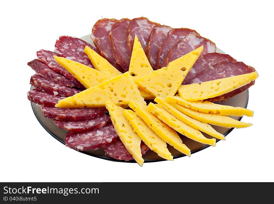 Cutting from a ham, sausage and cheese on a white background