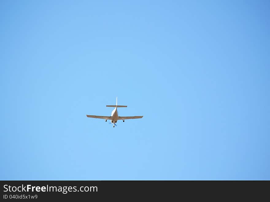 Small airplane approaching the runway for a landing. Small airplane approaching the runway for a landing