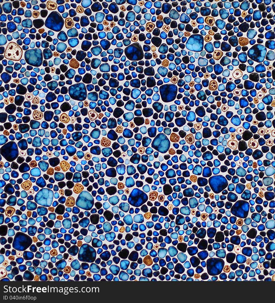 Colorful round edges blue brown stones mosaic background. Colorful round edges blue brown stones mosaic background