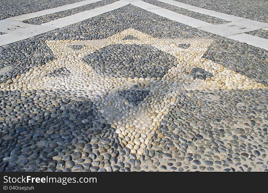 Star n the pavement - Vigevano s church Italy