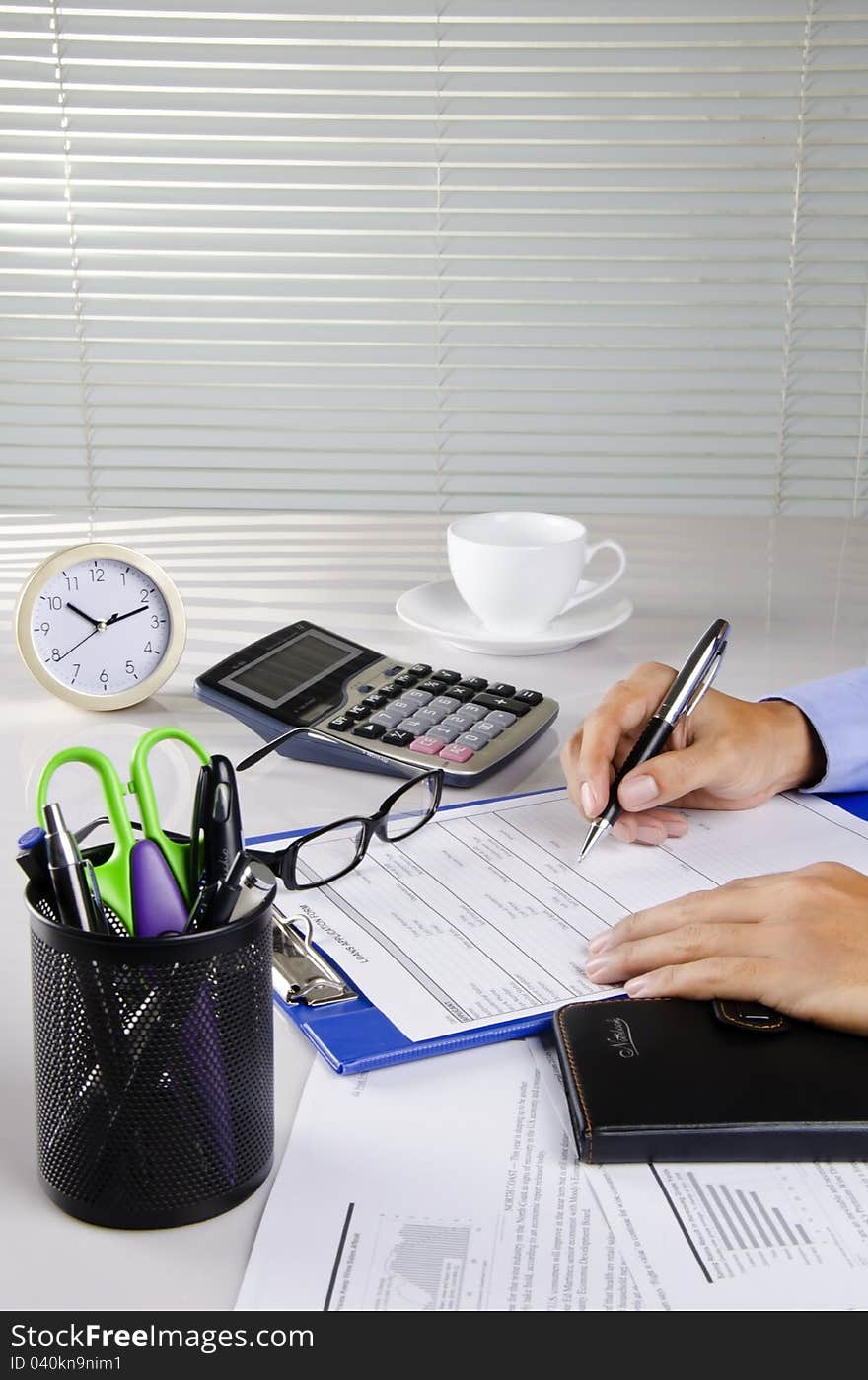 A businessman working on his desk