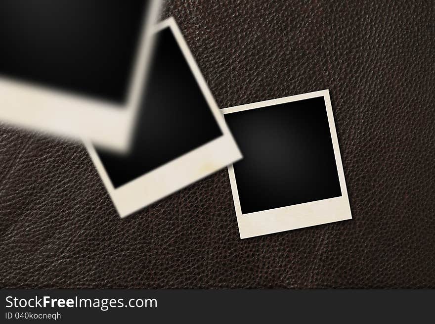 Instant films on brown leather background. Instant films on brown leather background