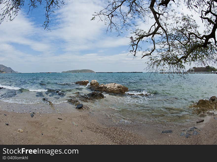 Beautiful beach on the island with many rocks