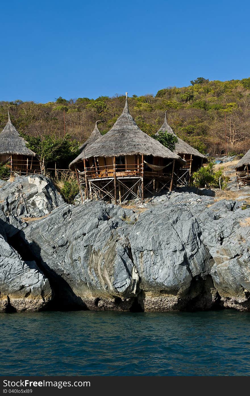 Hut on the cliff near the sea in Srichang island