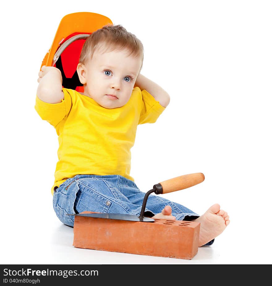 Child with hard hat and construction tools