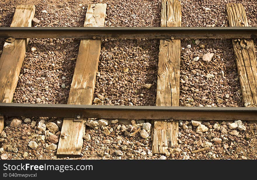 Close-up of old iron railway line. Close-up of old iron railway line.