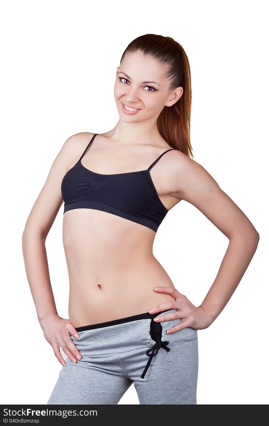 Young woman in sportswear, isolated on white background