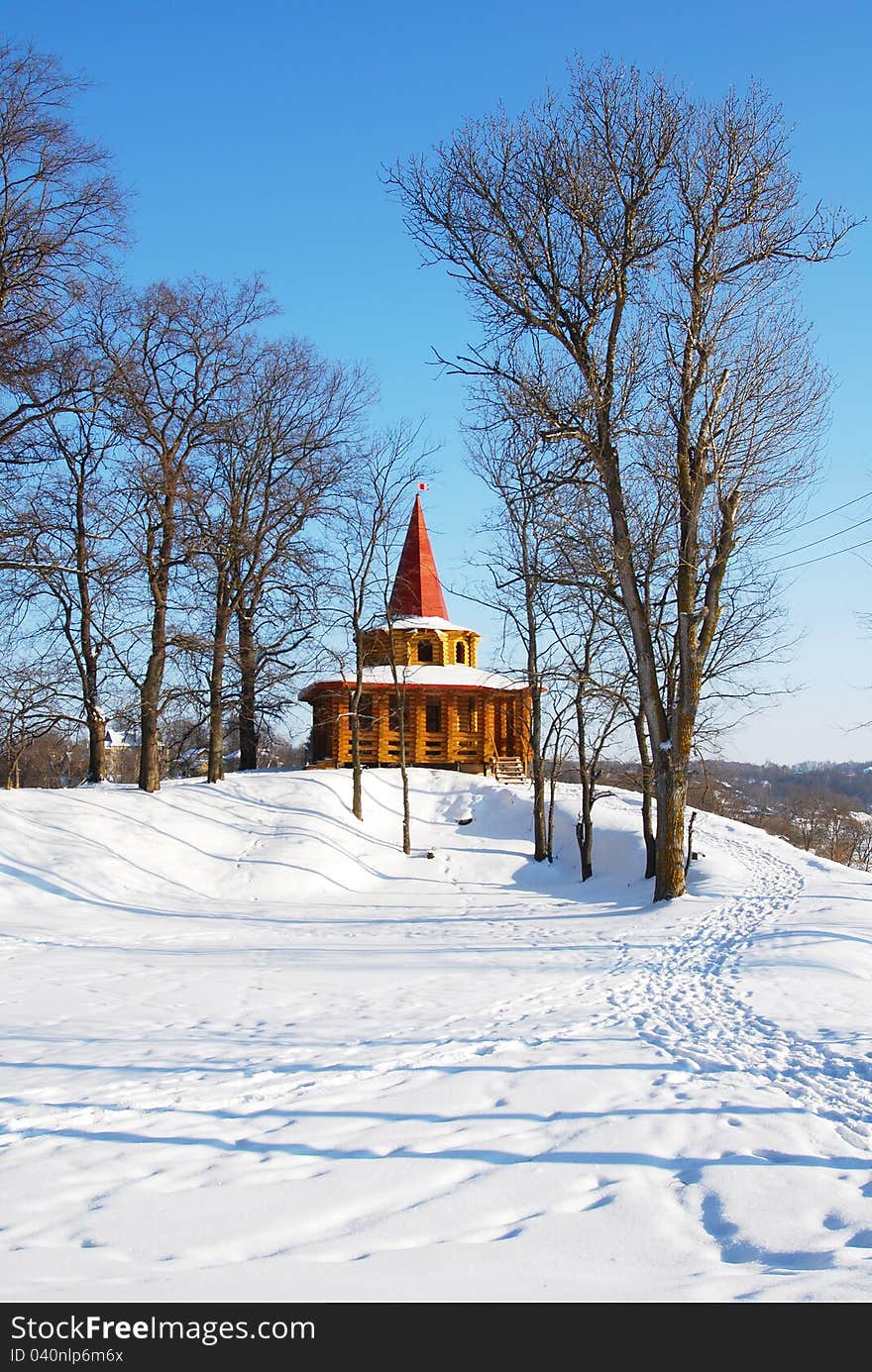 Wooden Arbor In Park In The Winter