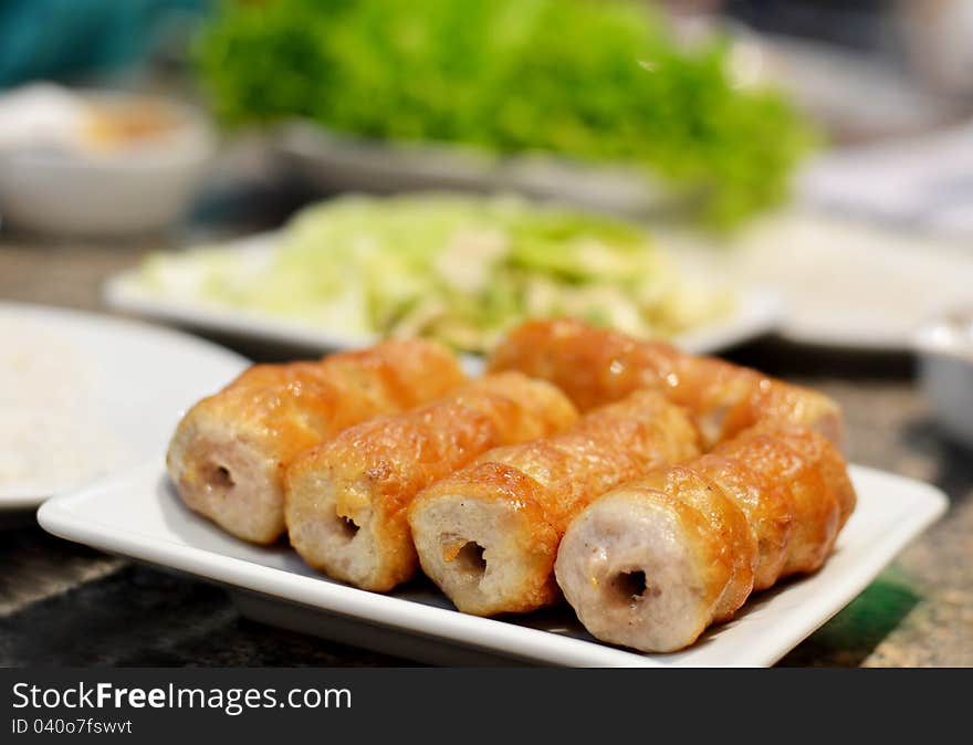 Grilled pork balls with condiments and Peanut Sauce. Grilled pork balls with condiments and Peanut Sauce