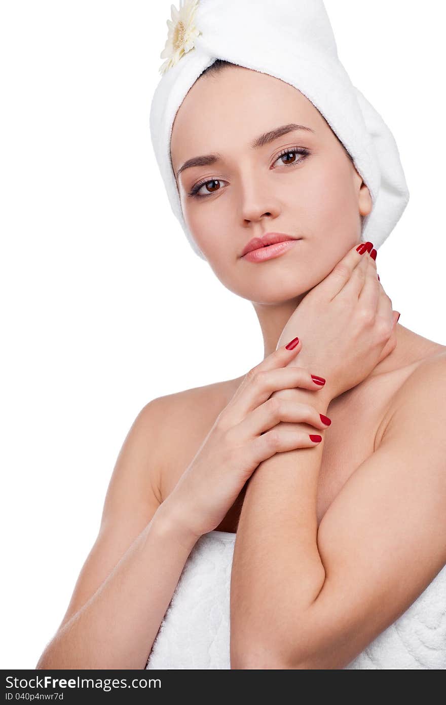 Beautiful woman in towel on head touching her clean face. Beautiful woman in towel on head touching her clean face