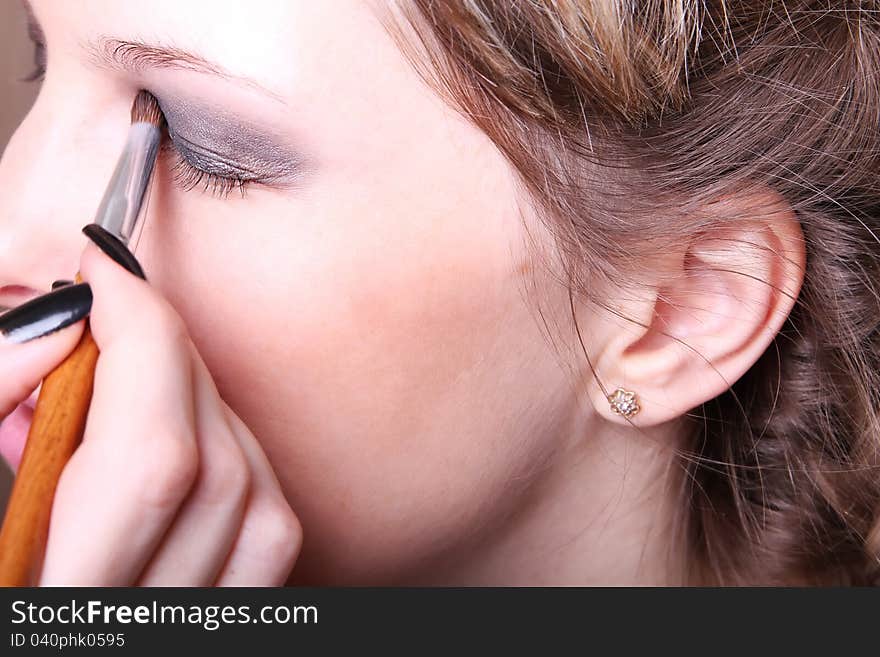 Makeup Artist Applies Eye Shadow