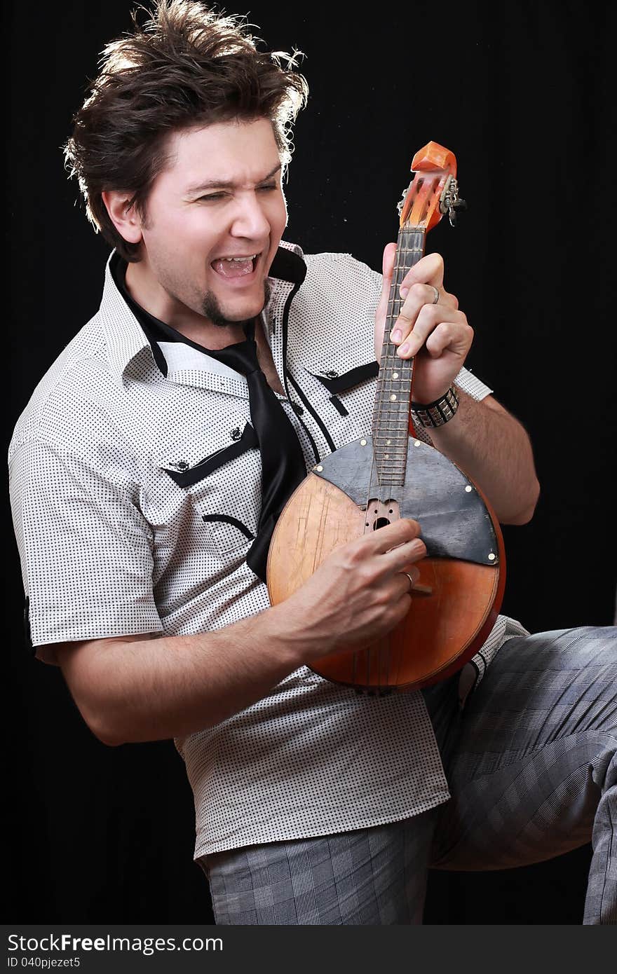 Young man with a musical instrument