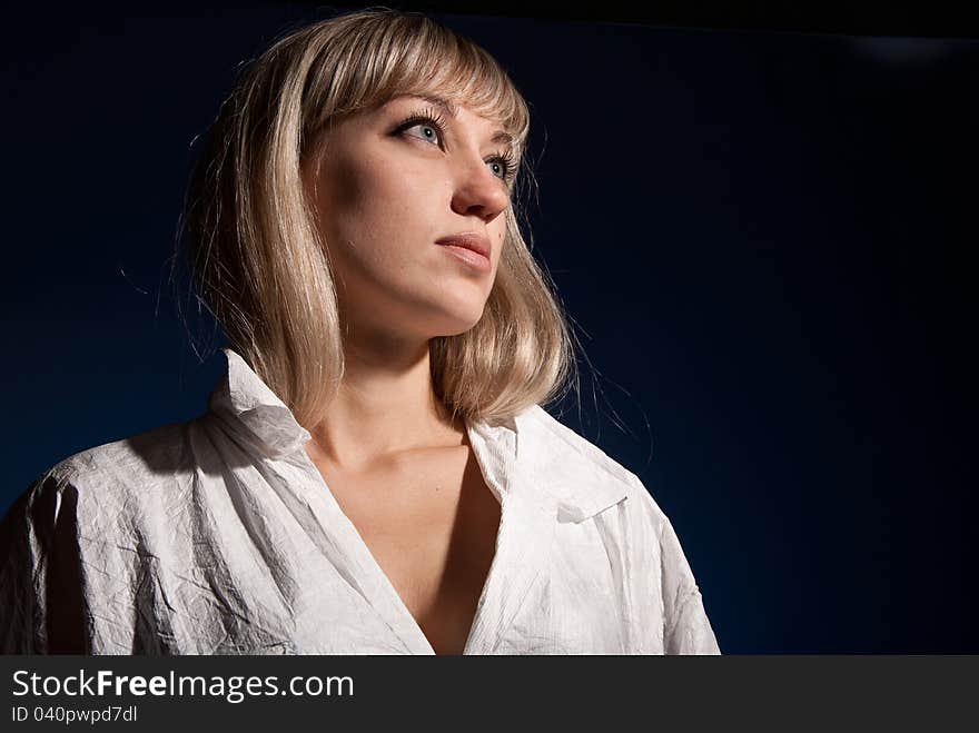 Portrait of girl on a dark background