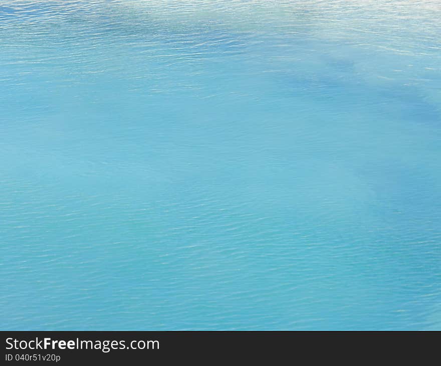 A hot water pool in the caldera of Yellowstone National Park. A hot water pool in the caldera of Yellowstone National Park.