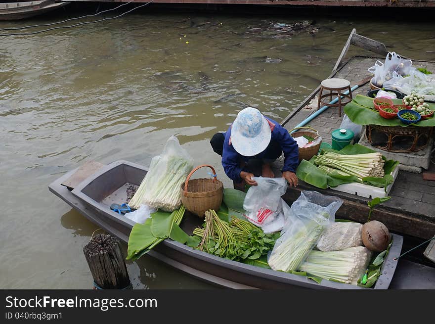 Rowboat at floating market Thailand