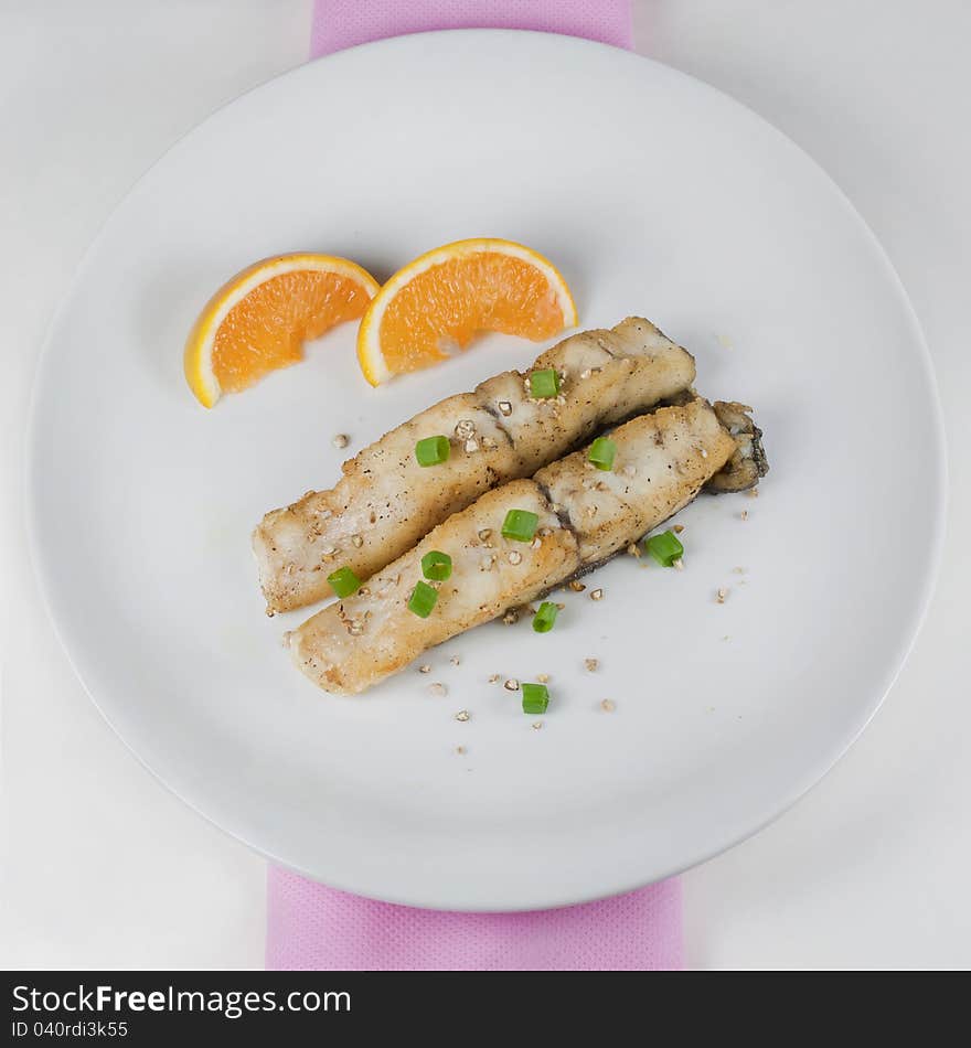 Fried fillet with pepper, green and orange. Fried fillet with pepper, green and orange.