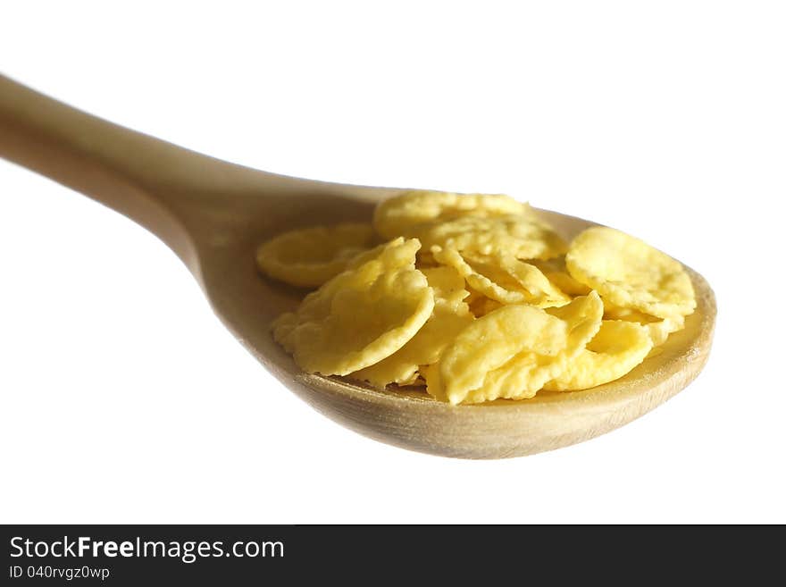 Cornflakes on wooden spoon