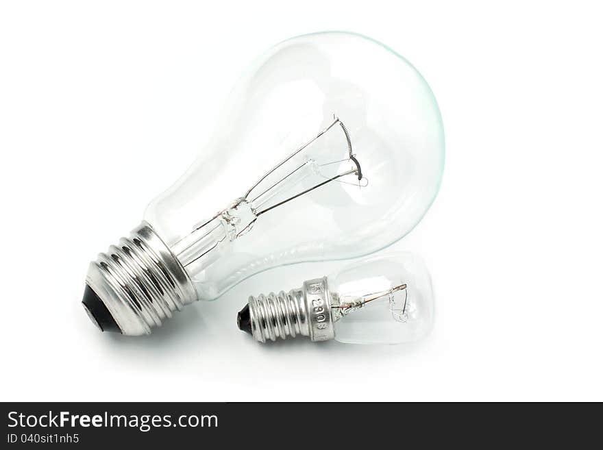 Two light bulbs on a white background