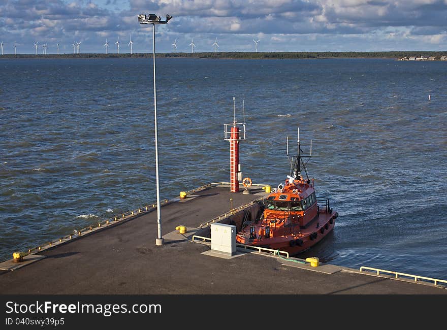 Orange Pilot boat in Virtsu harbour, Estonia. Orange Pilot boat in Virtsu harbour, Estonia