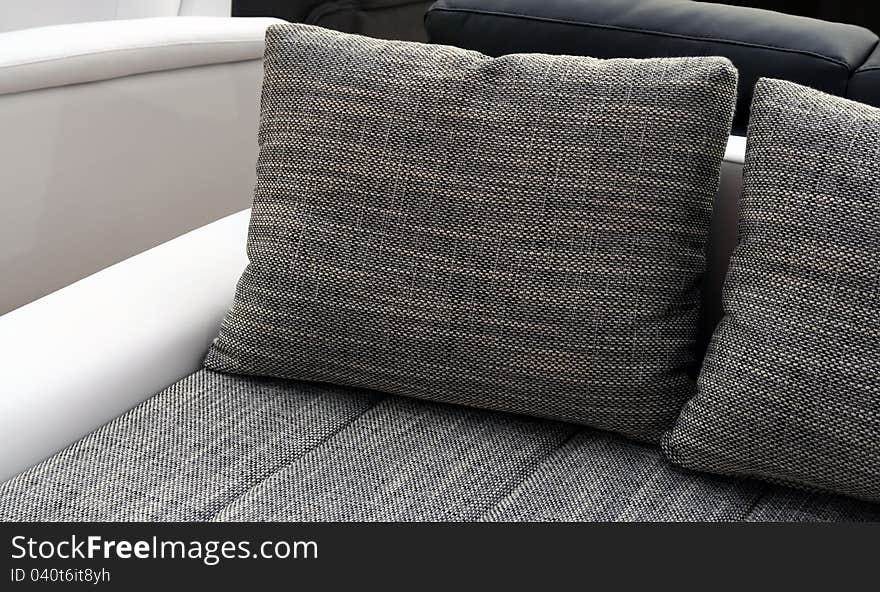 Pillows on the sofa.
Living room furniture with pillows.