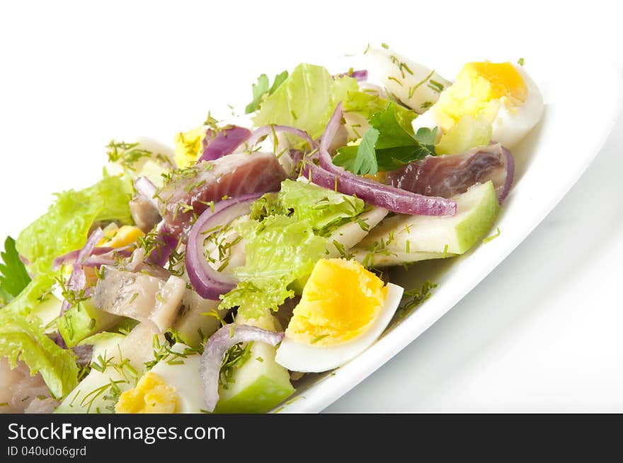 Herring salad, apples and eggs