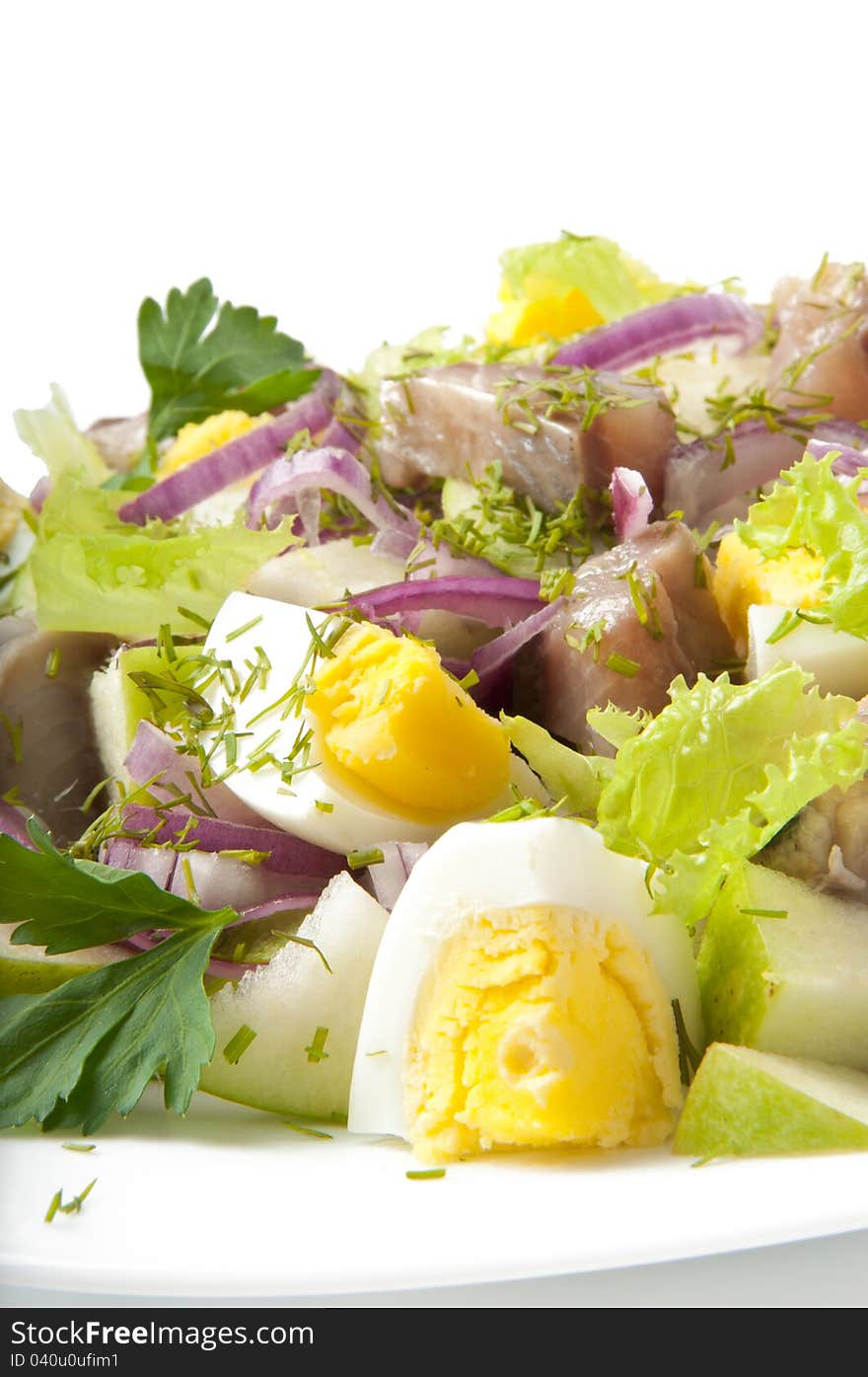 Herring salad, apples and eggs