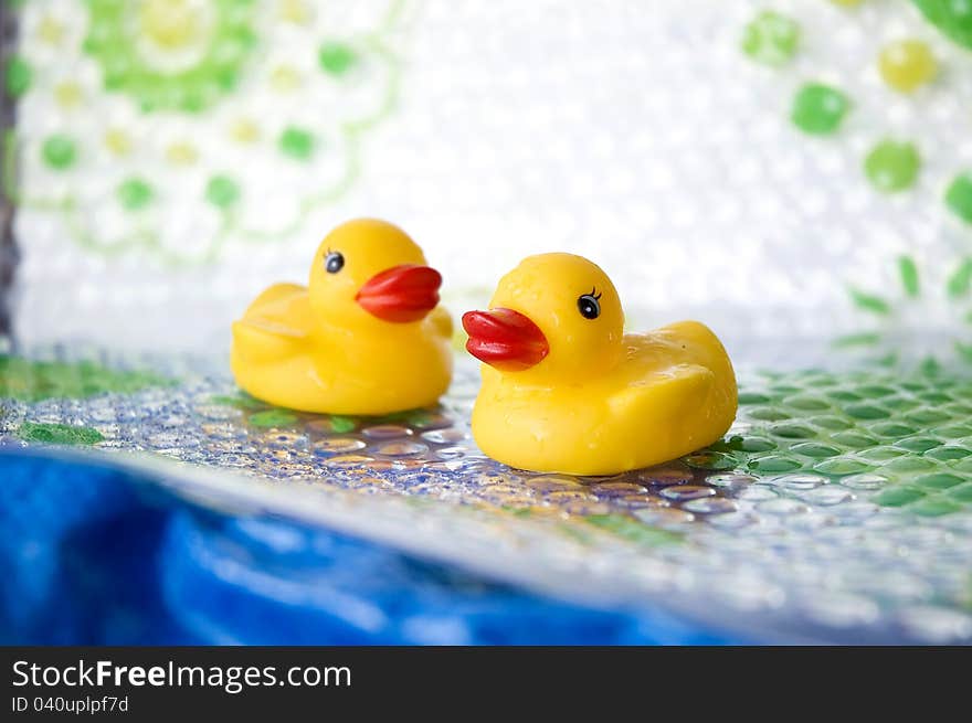 Two little yellow ducks for baby bath. Two little yellow ducks for baby bath