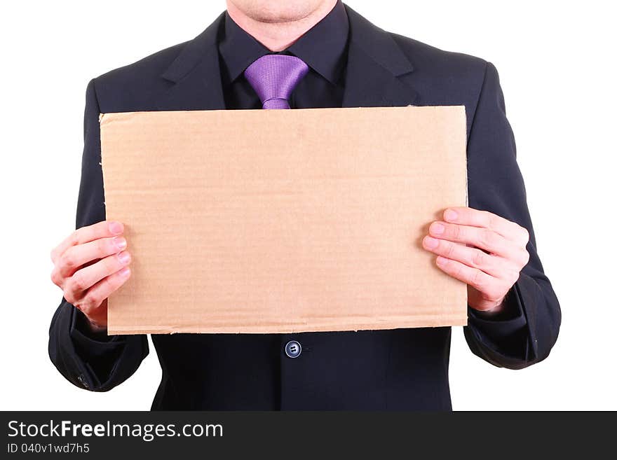 Businessman with blank cardboard sign in the hands