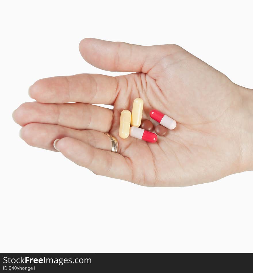 Close up of pills in hand.It is not isolated