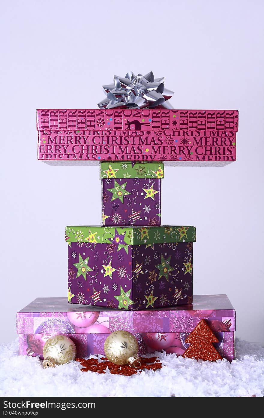 Colorful Christmas gifts with snow and christmas trees