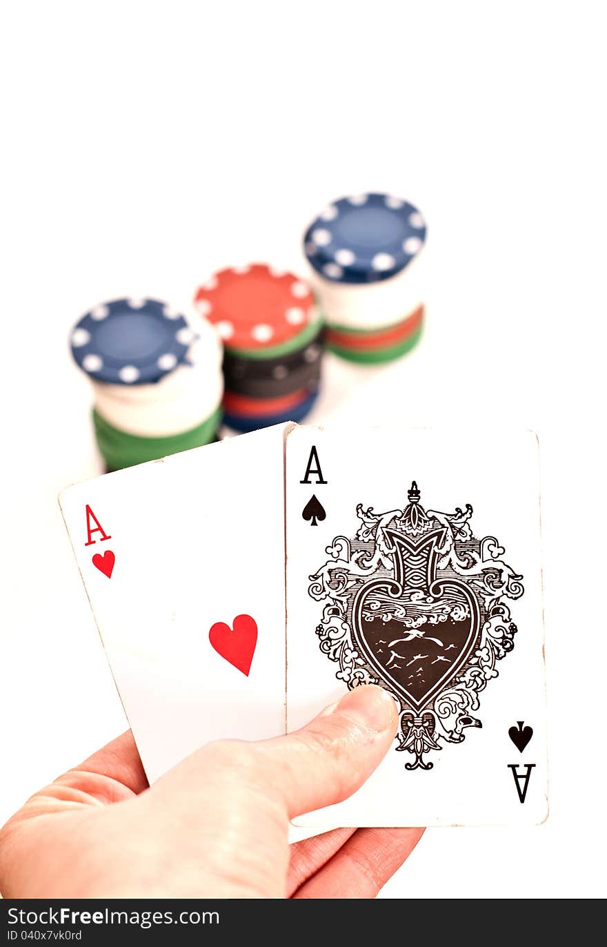 Woman hand holding poker king cards and chips on white background. Woman hand holding poker king cards and chips on white background