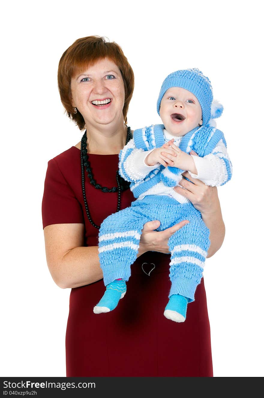 Grandmother with her grandson in her arms in the studio on a white background