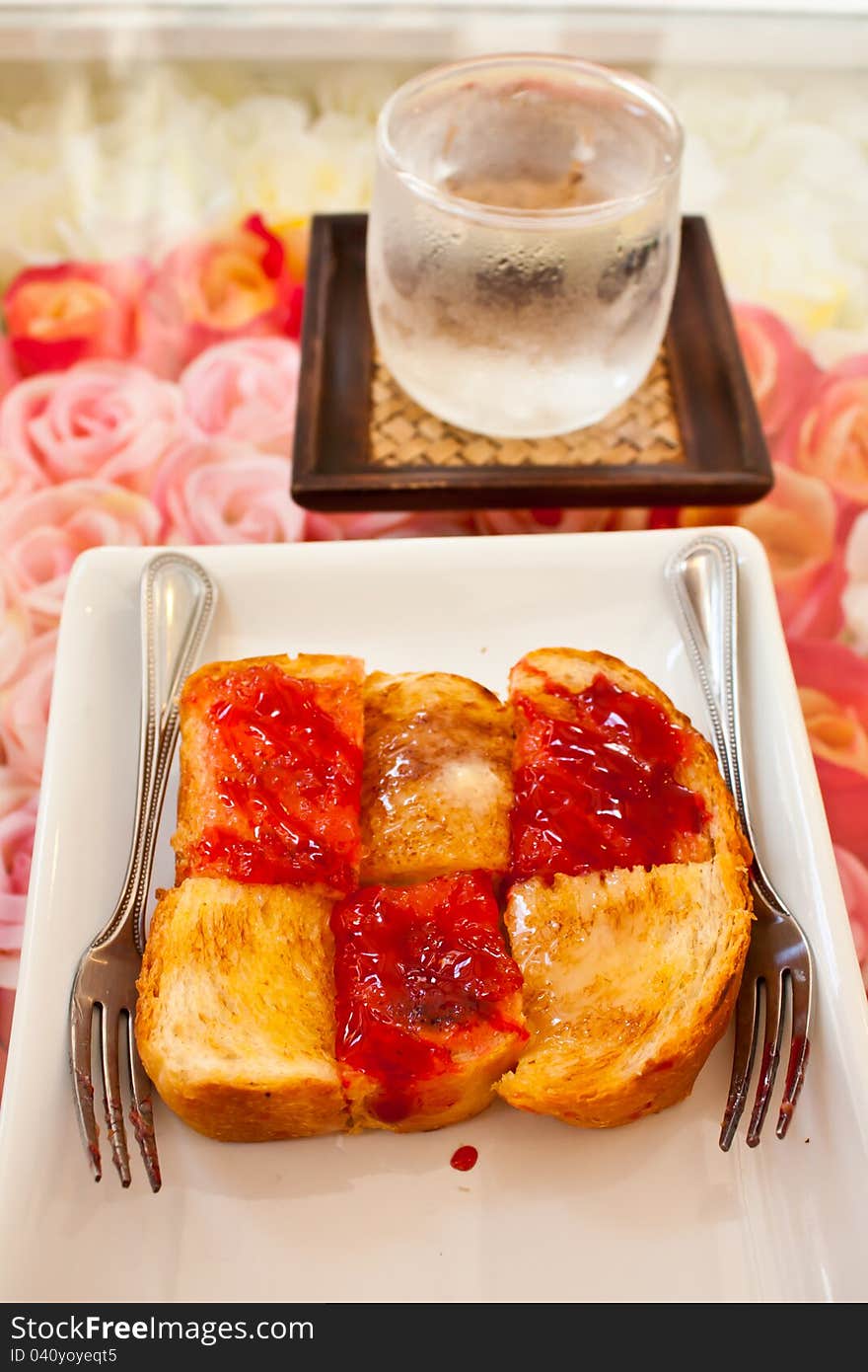 Slice Of Bread With Red Jam