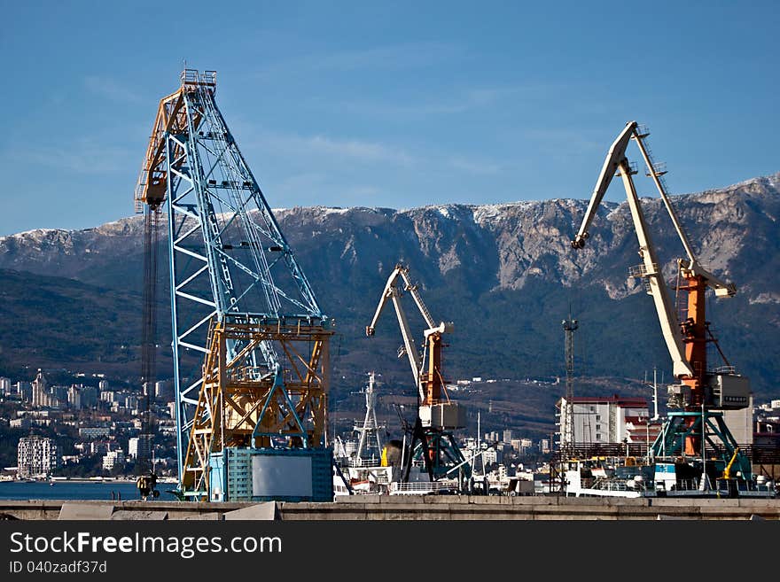 Loading cranes in an industrial port in Ukraine