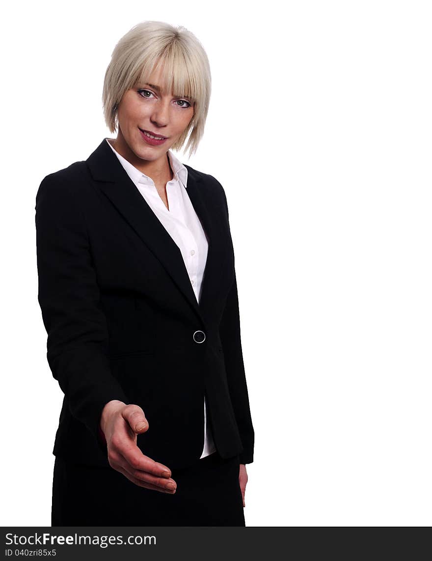 Young business woman ready to shake hands on white background with space to right.