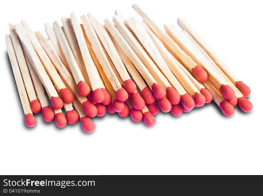 Closeup pile of matchsticks  on white