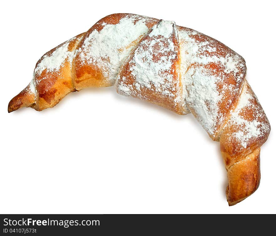 The big Italian croissant close up. It is isolated on a white background.