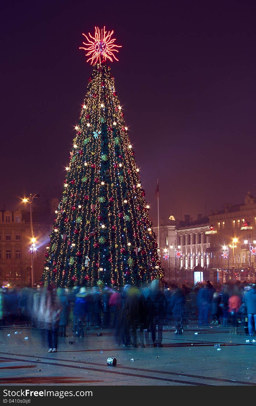 Night view of the christmas tree on a Cathedral square at New Years evening Vilnius, Lithuania. Vertical image. Night view of the christmas tree on a Cathedral square at New Years evening Vilnius, Lithuania. Vertical image