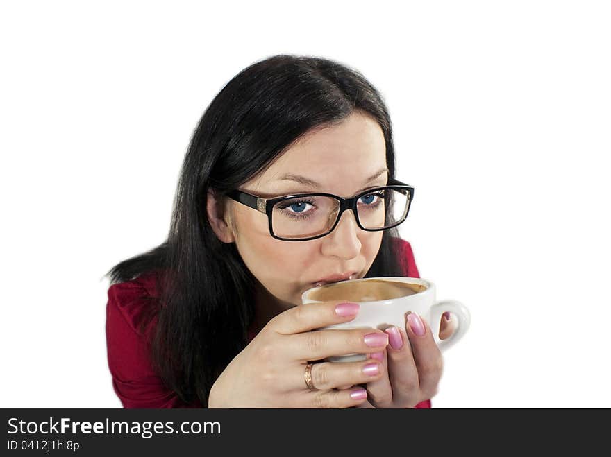 Brunette girl with glasses trying to flavored coffee. Brunette girl with glasses trying to flavored coffee