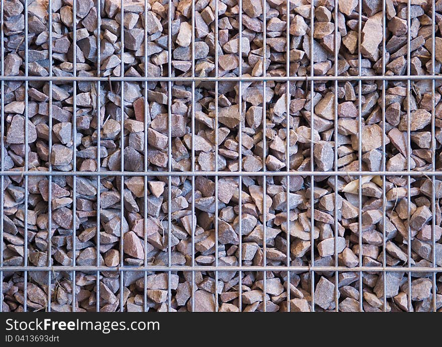 Gabion from the rubble with granit