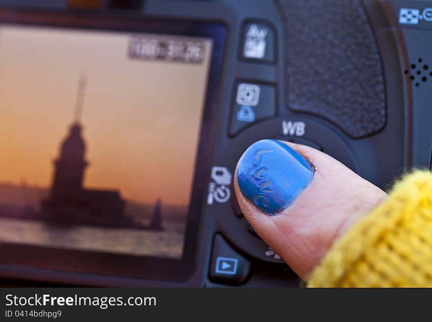 Checking photographs that were taken during a day in Istanbul