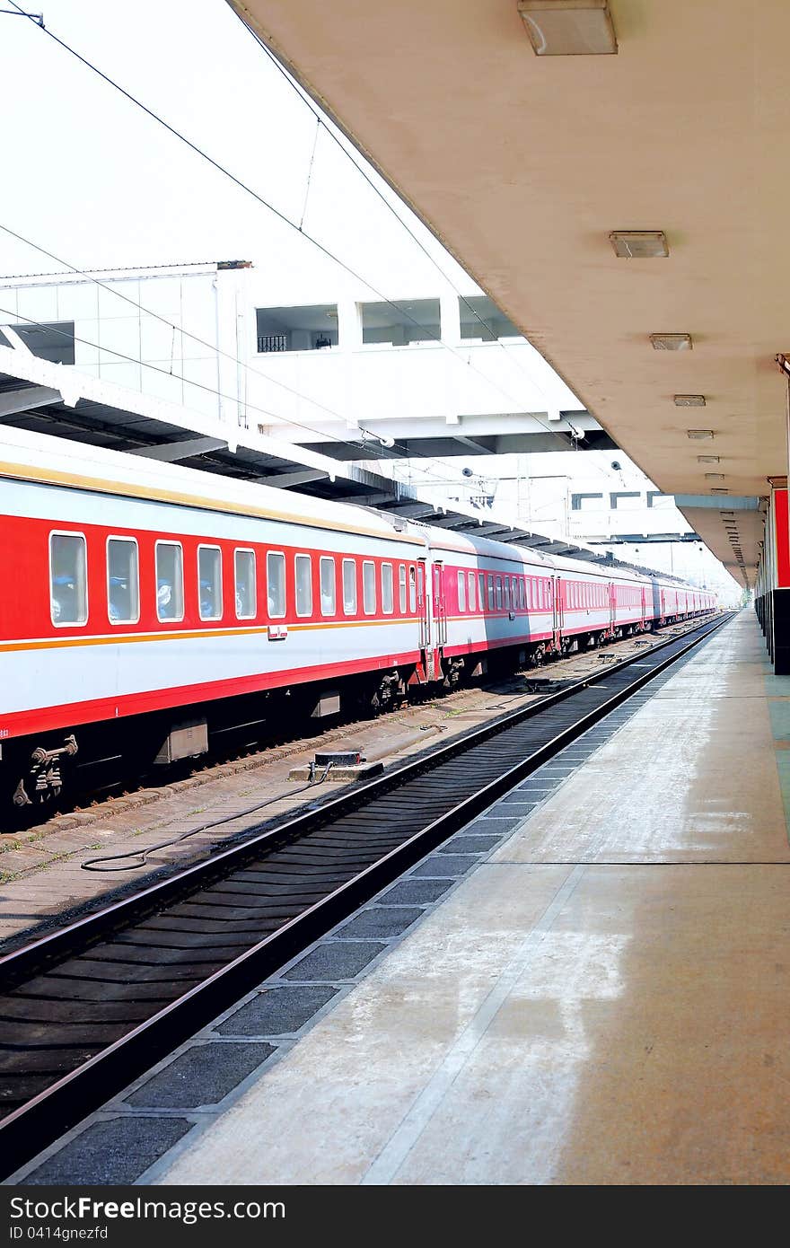 Platform in a railway station,a train arrived.