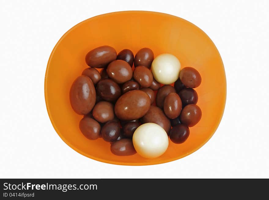 Chocolate candies with nuts inside im bowl