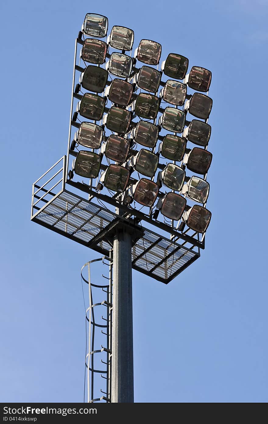 A bank of lights at a football stadium. A bank of lights at a football stadium