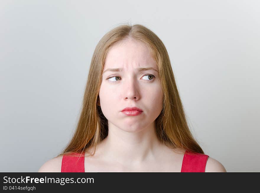 Cute woman in red with pouting lips.