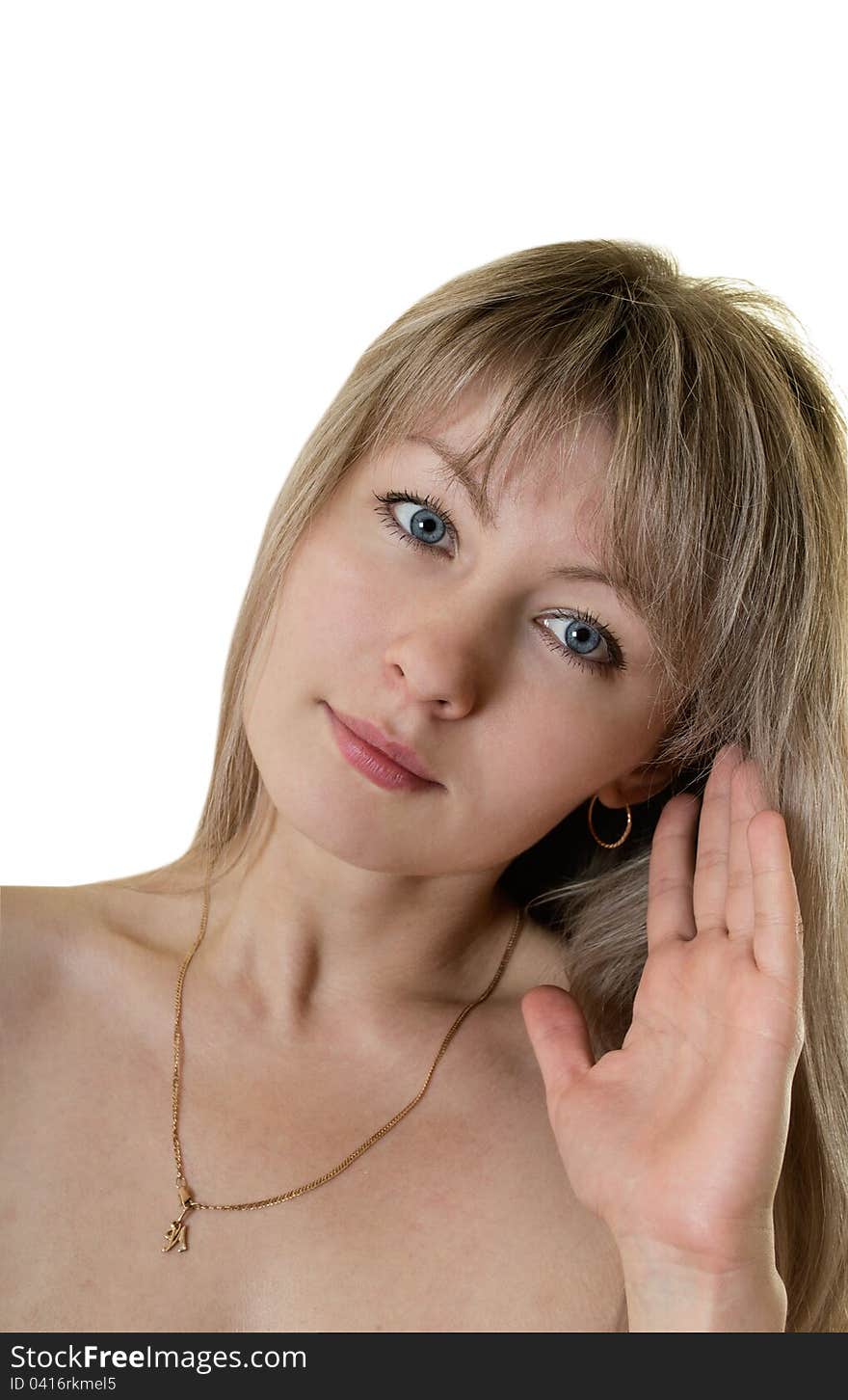 Pretty girl listening on a white background isolated