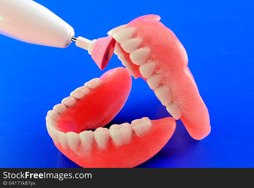 Artificial teeth and different types of tools for fine-tuning of prostheses. Artificial teeth and different types of tools for fine-tuning of prostheses