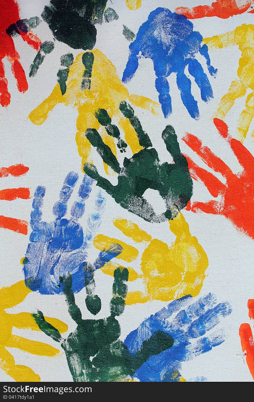 Colorful hand imprints in various shapes and patterns